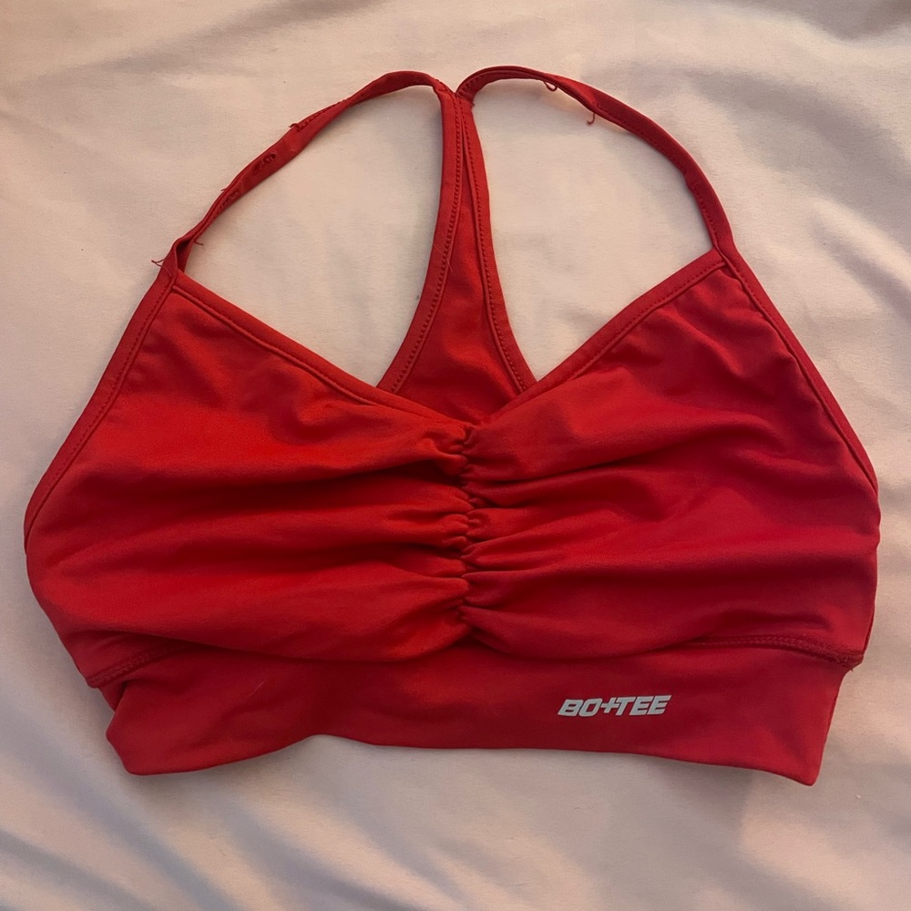 Bo and tee red slinky ruched v neck sports bra
